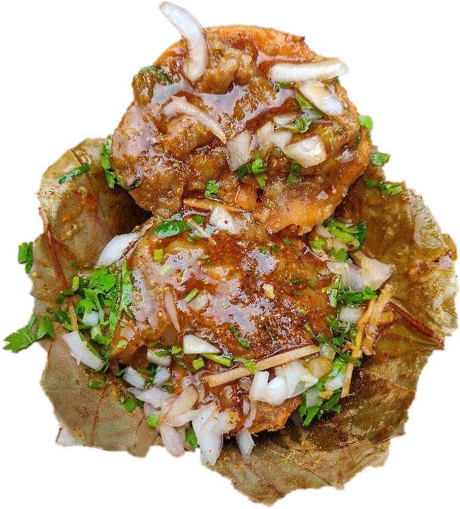 Diet Kachori topped with chutneys, onion, ginger and coriander